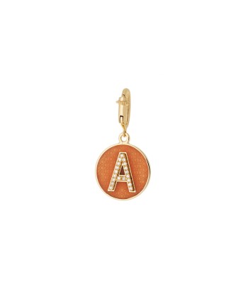 LETTER A CHARM  IN YELLOW GOLD, DIAMONDS AND ORANGE ENAMEL suggérées chez